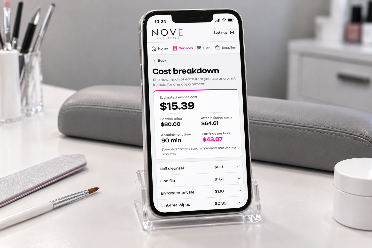 Nove service calculator displayed on a phone at a manicure station